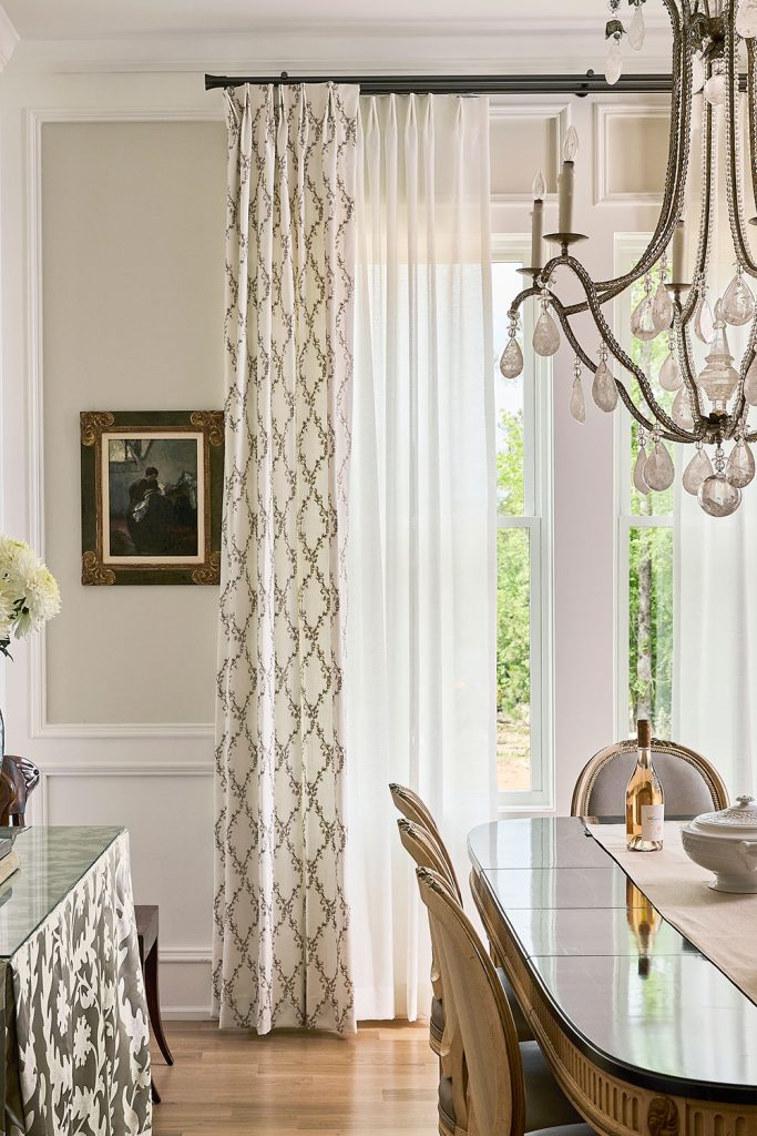 Olivia Pleat Drapery and Sheers in an elegant dining room.