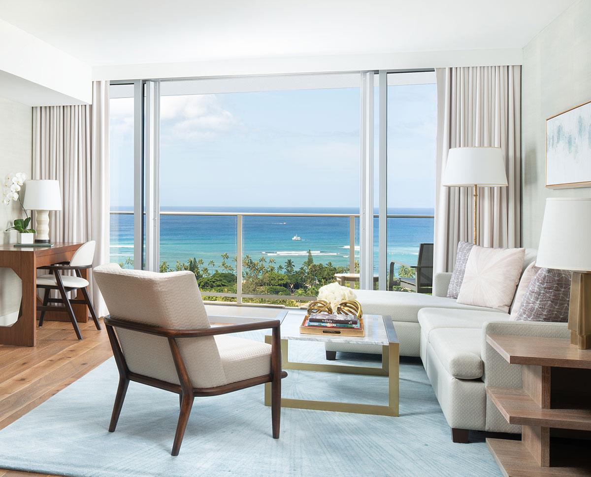 Motorized Forest Drapery Hardware in a living room overlooking a beach.